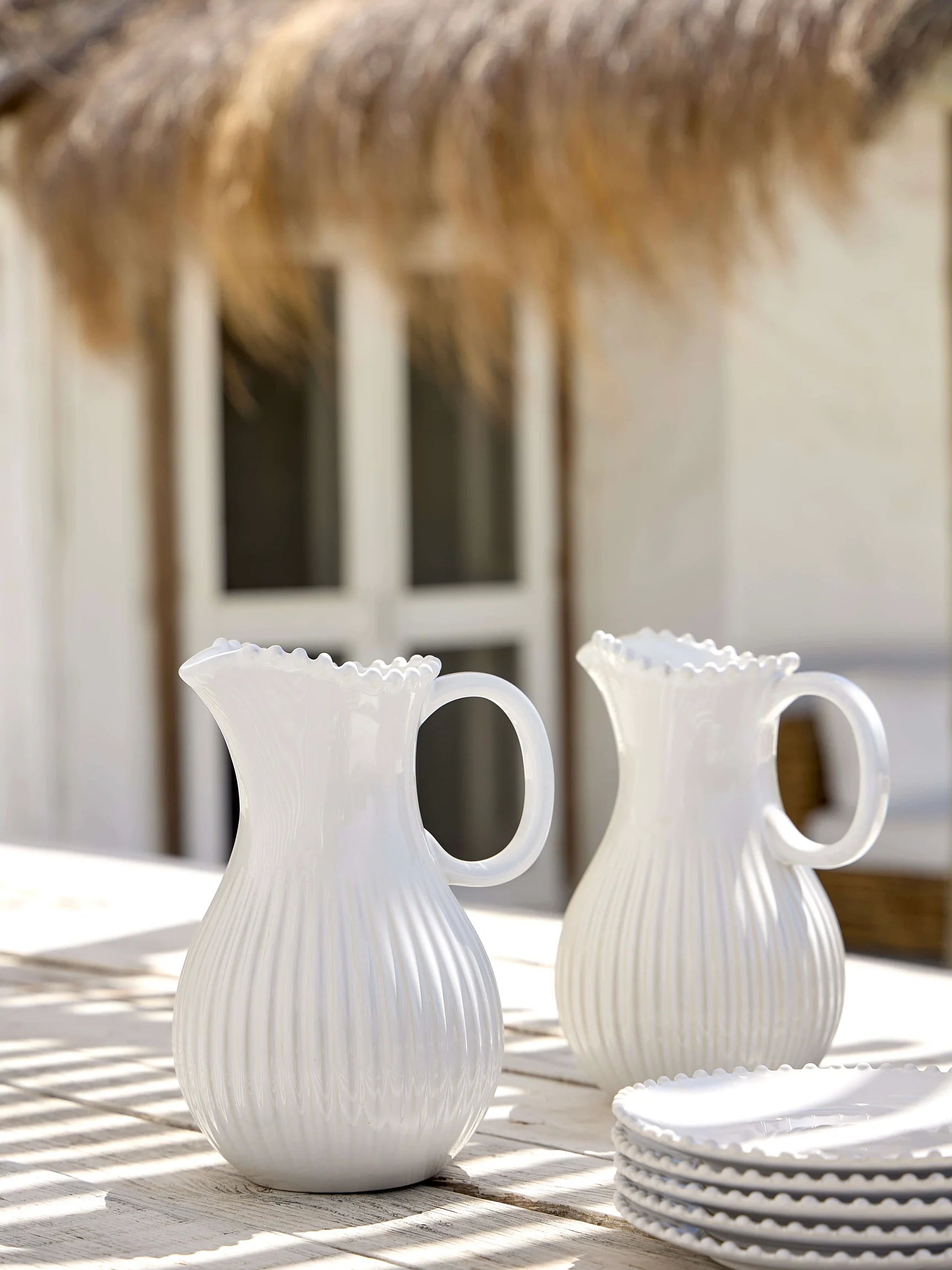 WHITE CHINA BOBBLE EDGE JUG